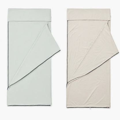 QEZER milky green sleeping bag liner shown zipped and fully opened with size measurements