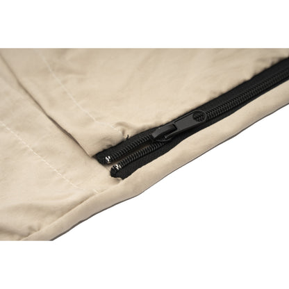 Close-up of dual zipper sliders on a QEZER khaki travel sleep sack
