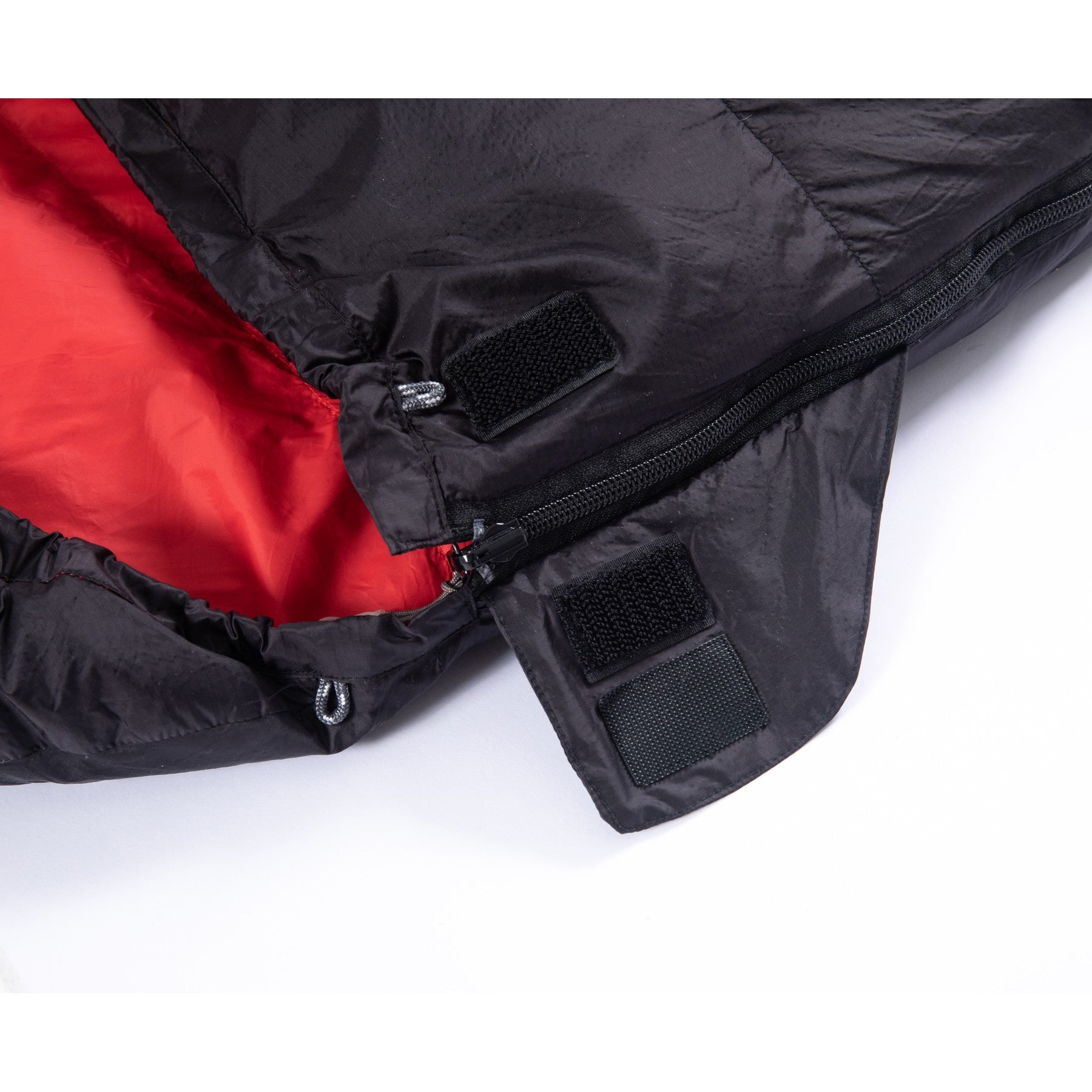 Hook-and-loop zipper guard on a QEZER rectangular down sleeping bag