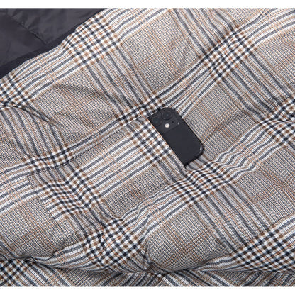 Inner storage pocket holding a smartphone inside QEZER plaid sleeping bag