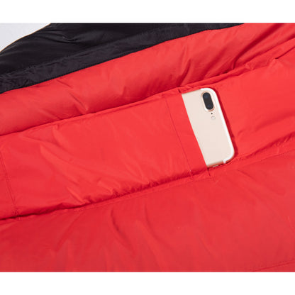 Inner storage pocket holding a smartphone inside a QEZER sleeping bag